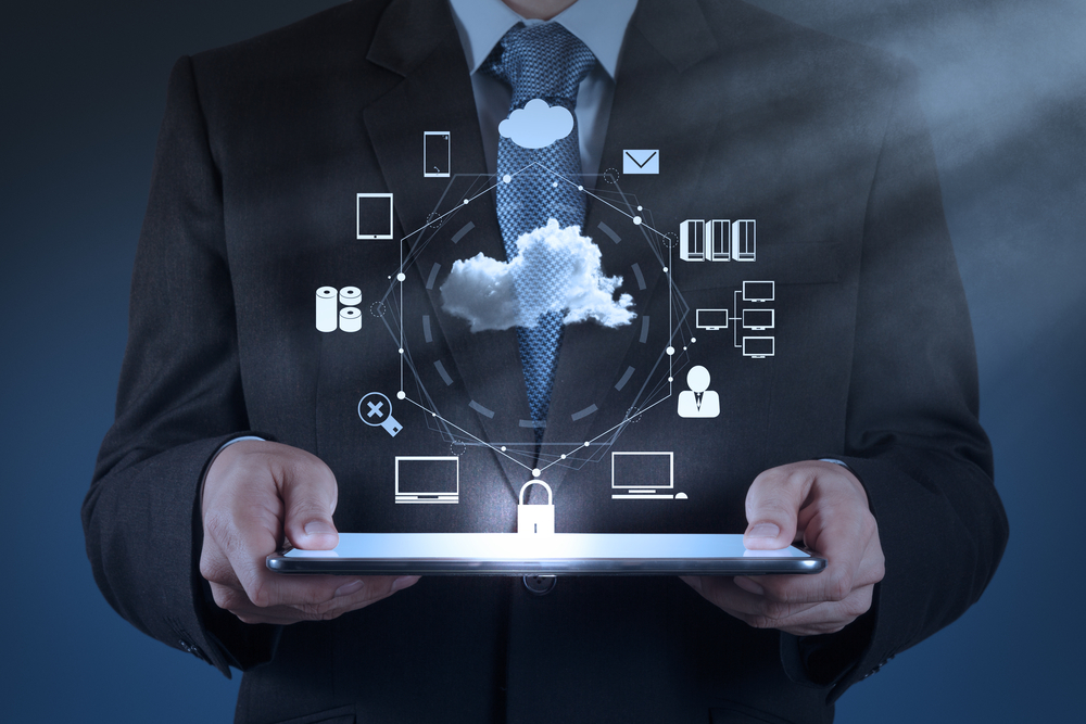 Businessman hand working with a Cloud Computing diagram on the new computer interface as concept-2